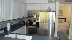 Rumah Comfort, 2 kamar tidur, pemandangan kolam renang | Dapur pribadi | Mesin pembuat kopi/teh, lemari es, dan microwave