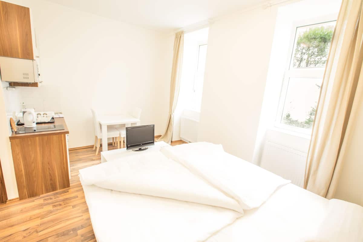 1 habitación y ropa de cama de alta calidad
