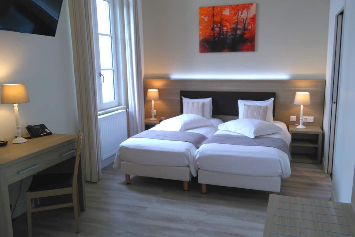 superior twin room, 2 single beds | minibar, in-room safe, individually decorated, desk