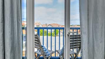 Habitación familiar, vistas a la ciudad | Caja fuerte y wifi gratis