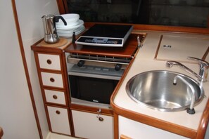 Standard Apartment, 2 Bedrooms | Private kitchenette | Fridge, microwave, coffee/tea maker