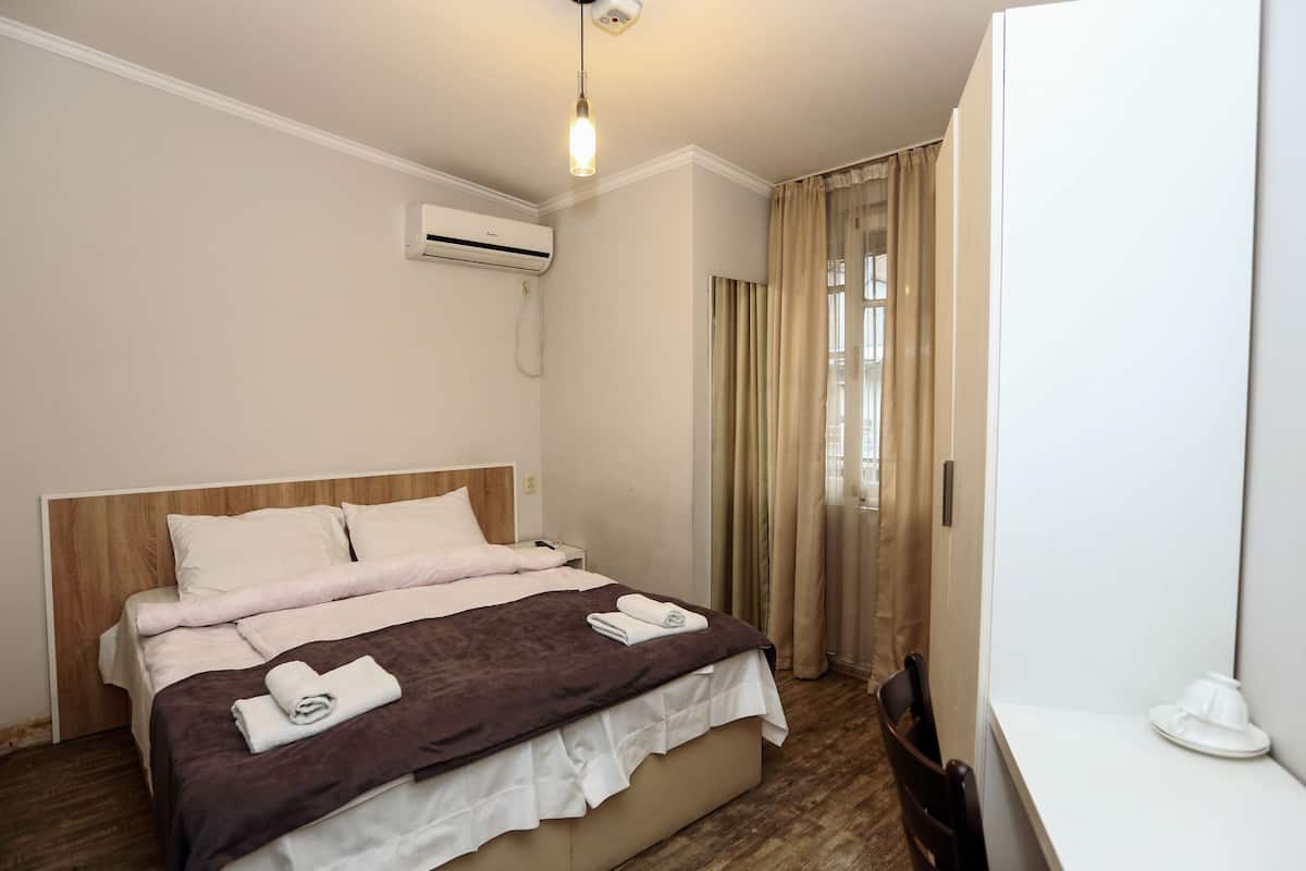 Camera Standard con letto matrimoniale o 2 letti singoli | 2 camere, una cassaforte in camera, con arredamento individuale