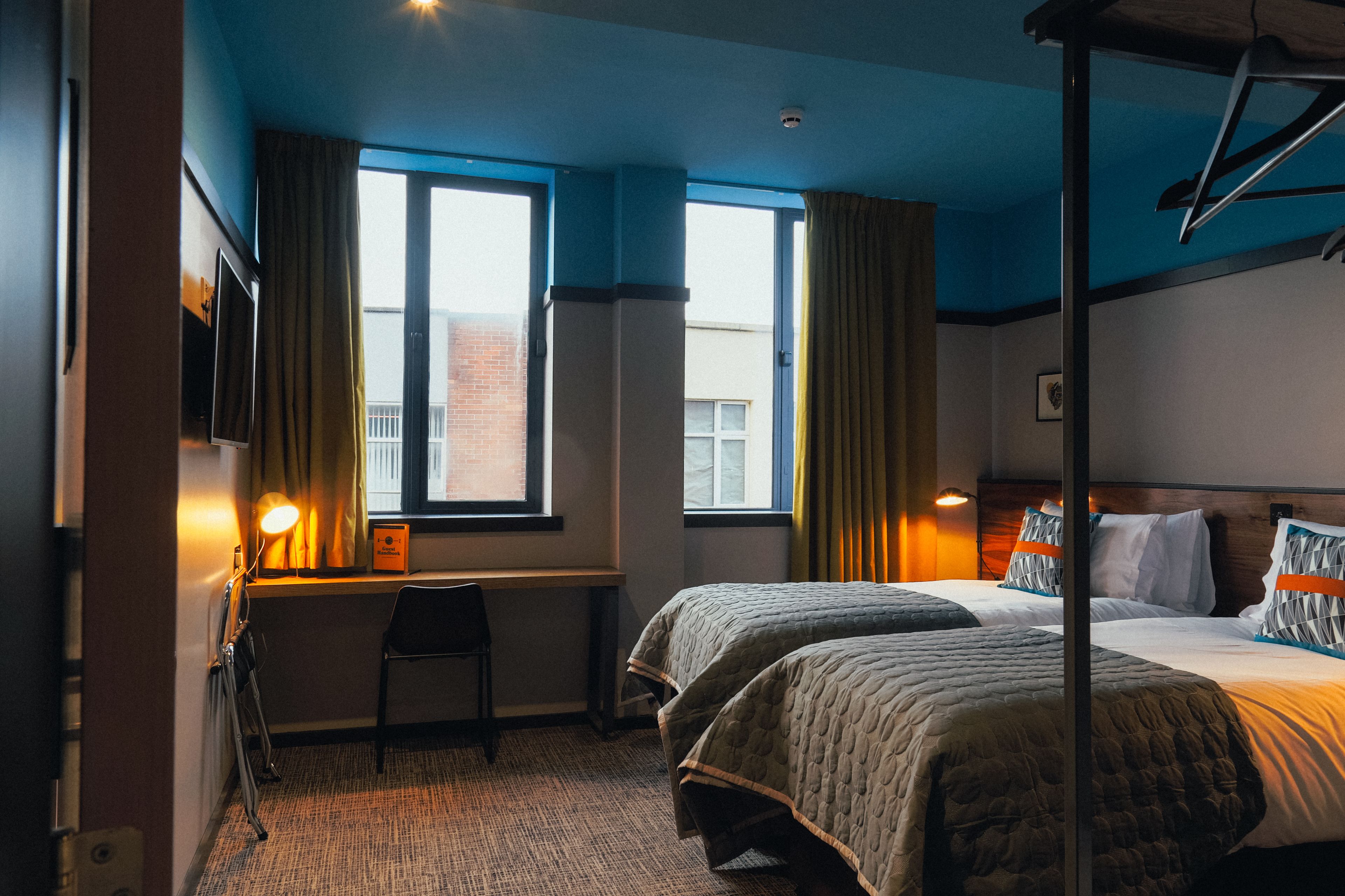 twin room (comfy) | living area | flat-screen tv