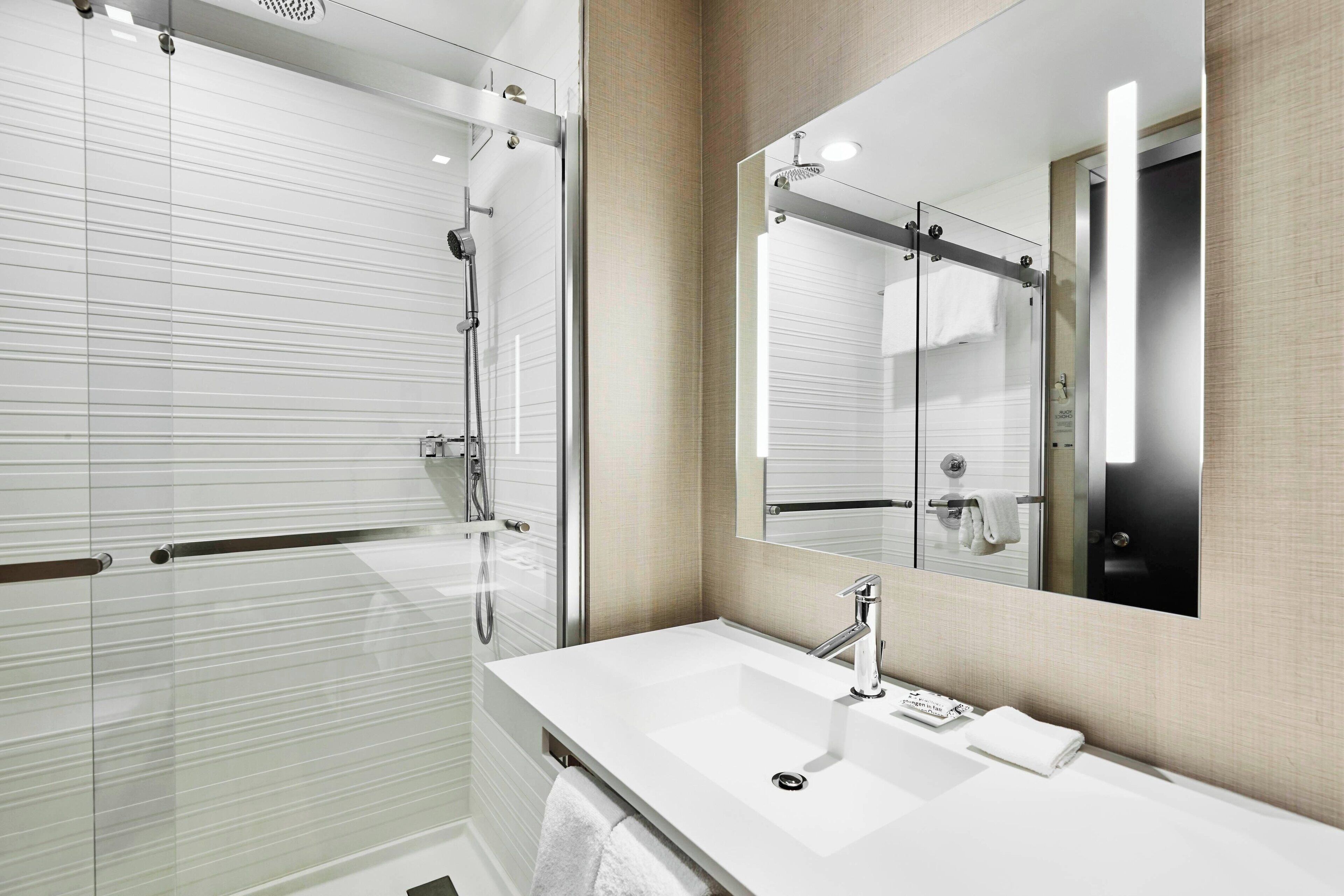 combined shower/bathtub, free toiletries, hair dryer, towels