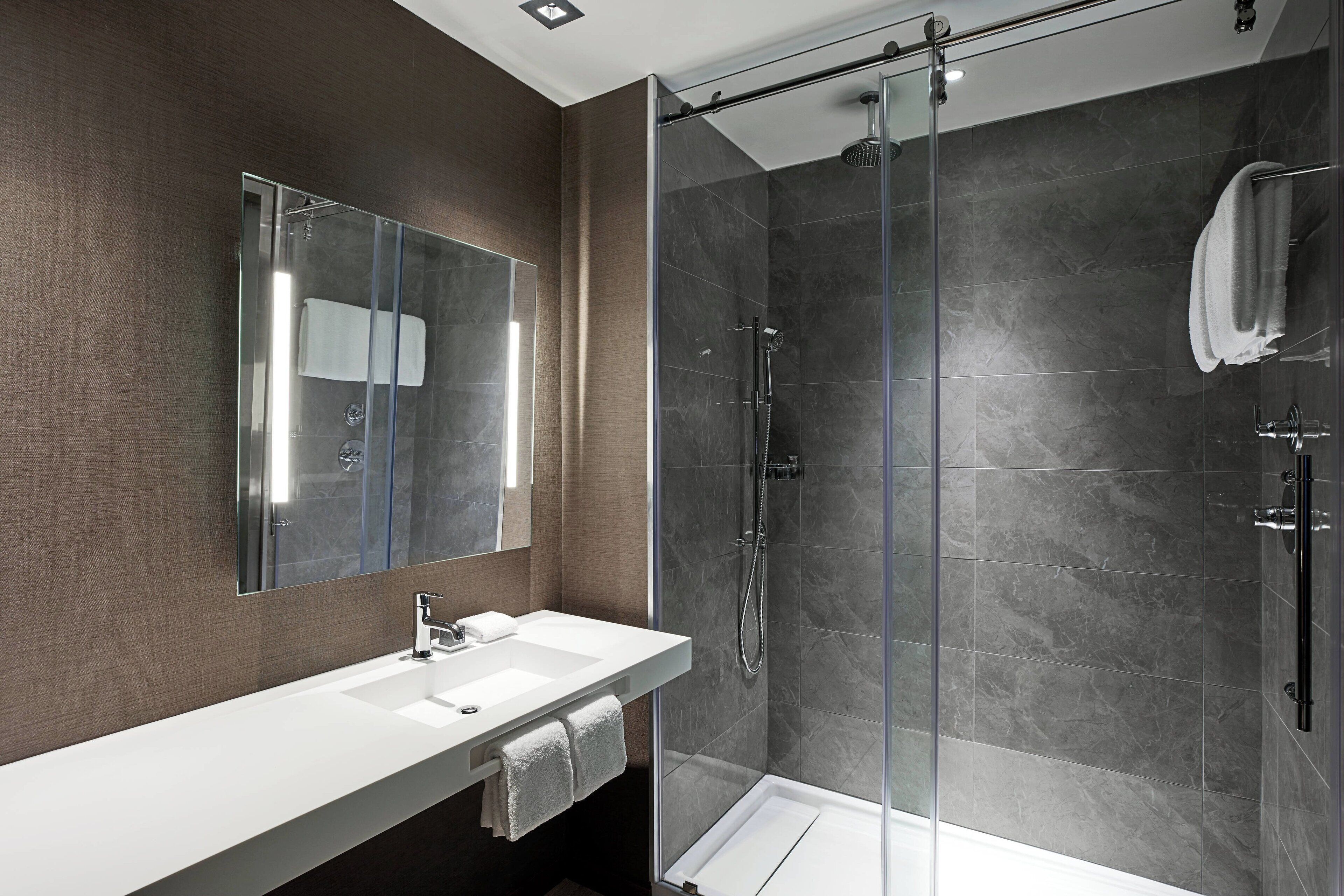 eco-friendly toiletries, hair dryer, towels