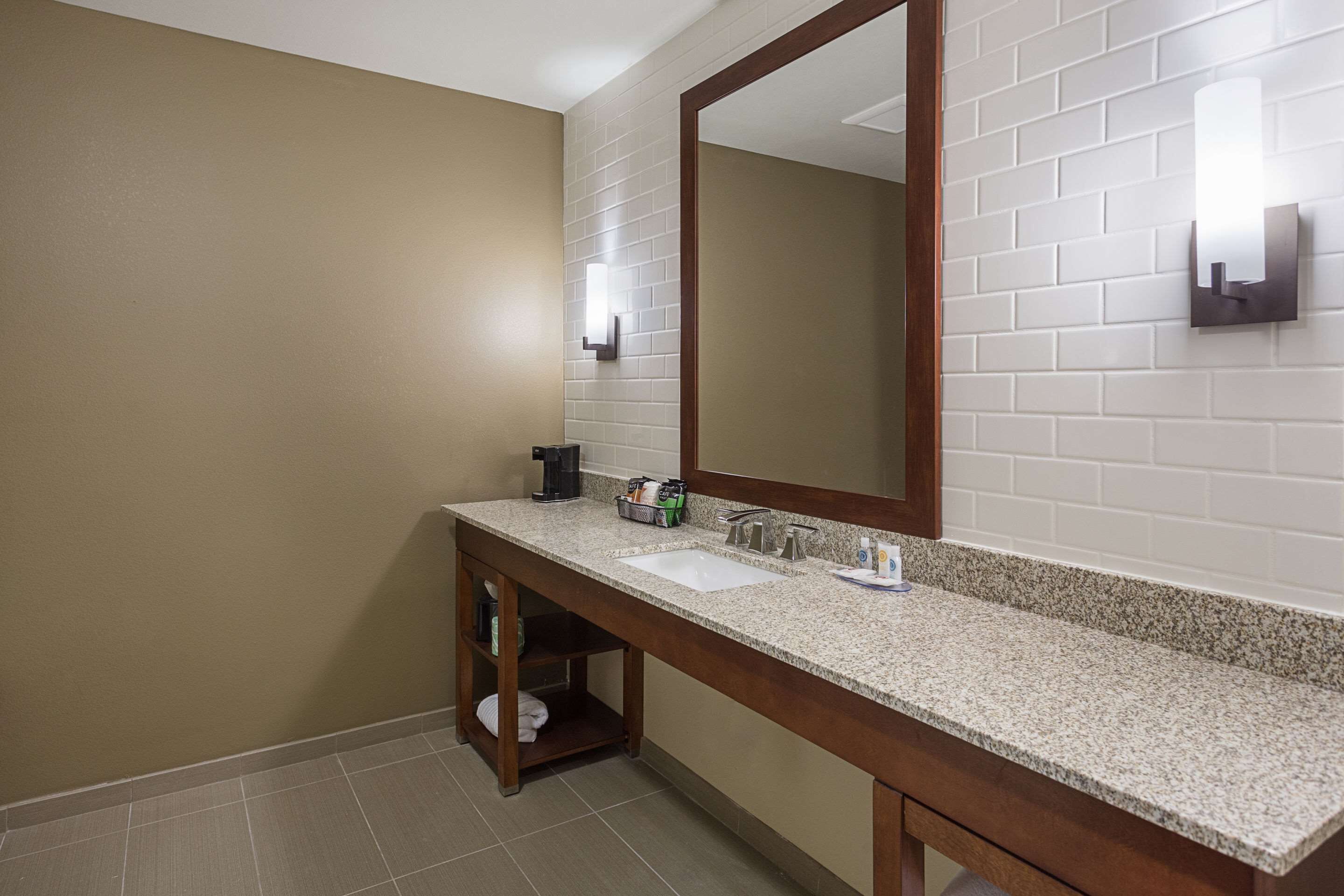 suite, 1 king bed, non smoking (larger room) | bathroom | hair dryer, towels