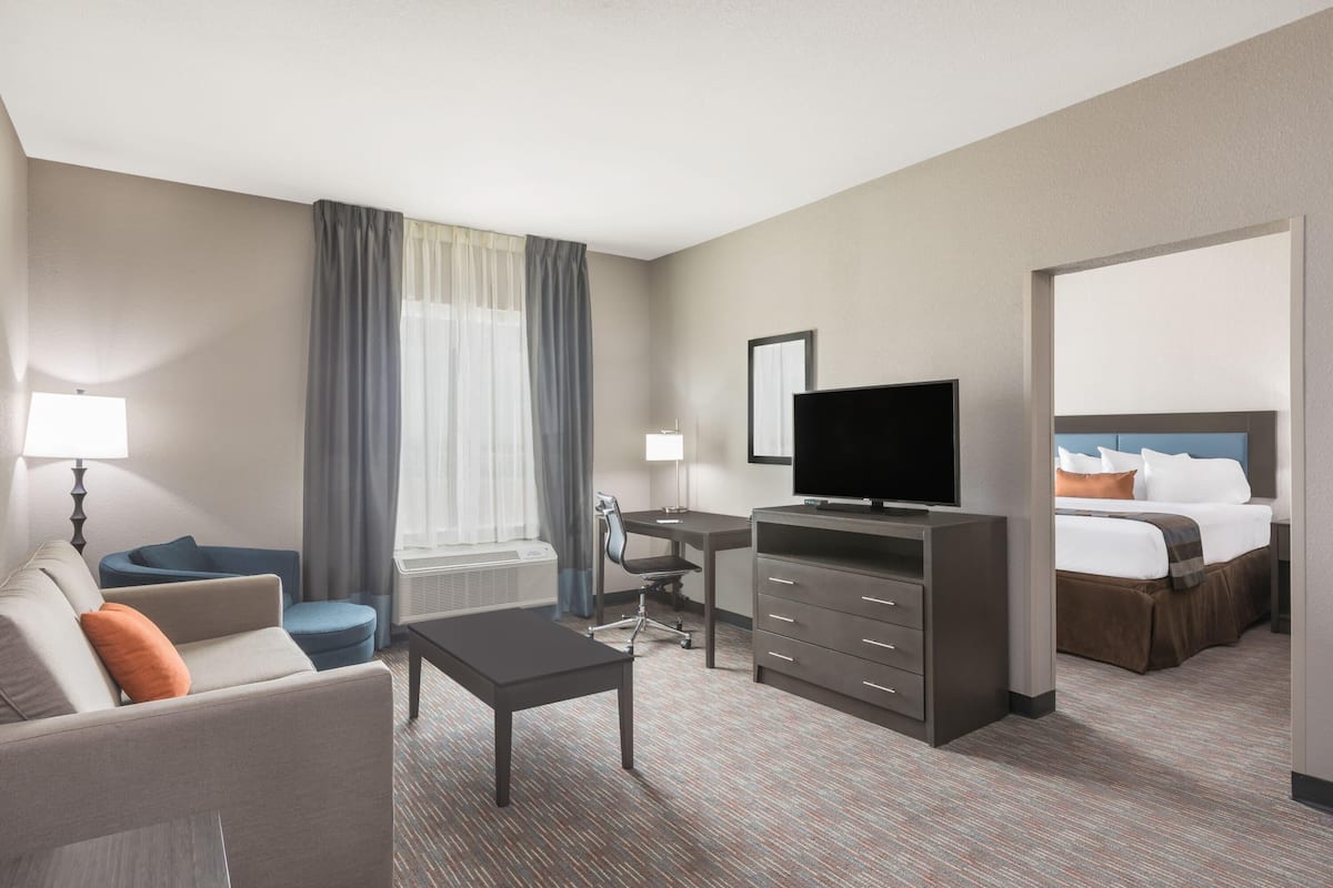 Desk, blackout drapes, soundproofing, iron/ironing board