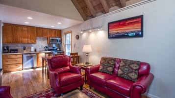 Family Apartment, 1 Bedroom | Living area | TV, fireplace, DVD player