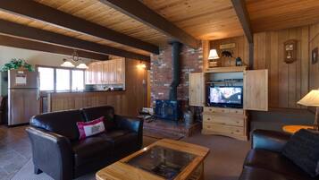 Family Apartment, 3 Bedrooms | Living room | TV, fireplace, DVD player