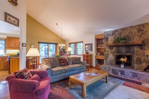 Family Apartment, 3 Bedrooms | Living room | TV, fireplace, DVD player, table tennis