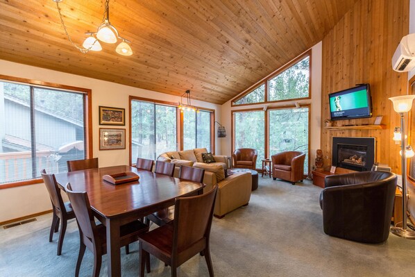 Family Apartment, 4 Bedrooms | Living area | Flat-screen TV, fireplace, DVD player