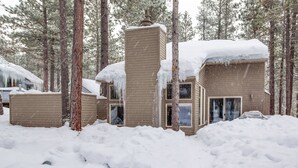 A cabin surrounded by snow-covered trees. - Leisure 5 (Bend)
