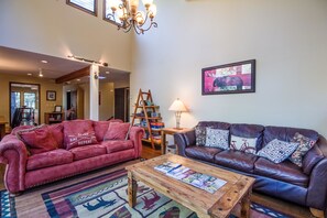 Family Apartment, 5 Bedrooms | Living area | TV, fireplace, DVD player, ping pong