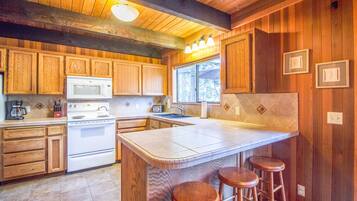 Family Apartment, 2 Bedrooms | Private kitchen | Fridge, microwave, coffee/tea maker