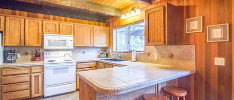 Family Apartment, 2 Bedrooms | Private kitchen | Fridge, microwave, coffee/tea maker