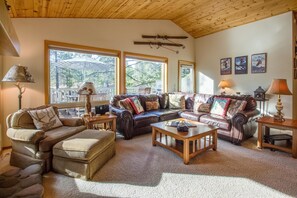 Family Apartment, 3 Bedrooms | Living area | TV, fireplace, DVD player