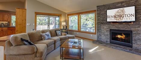 Family Apartment, 4 Bedrooms | Living area | TV, fireplace, DVD player