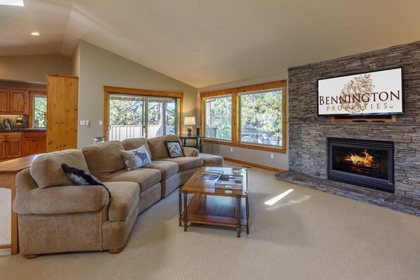 Family Apartment, 4 Bedrooms | Living area | TV, fireplace, DVD player