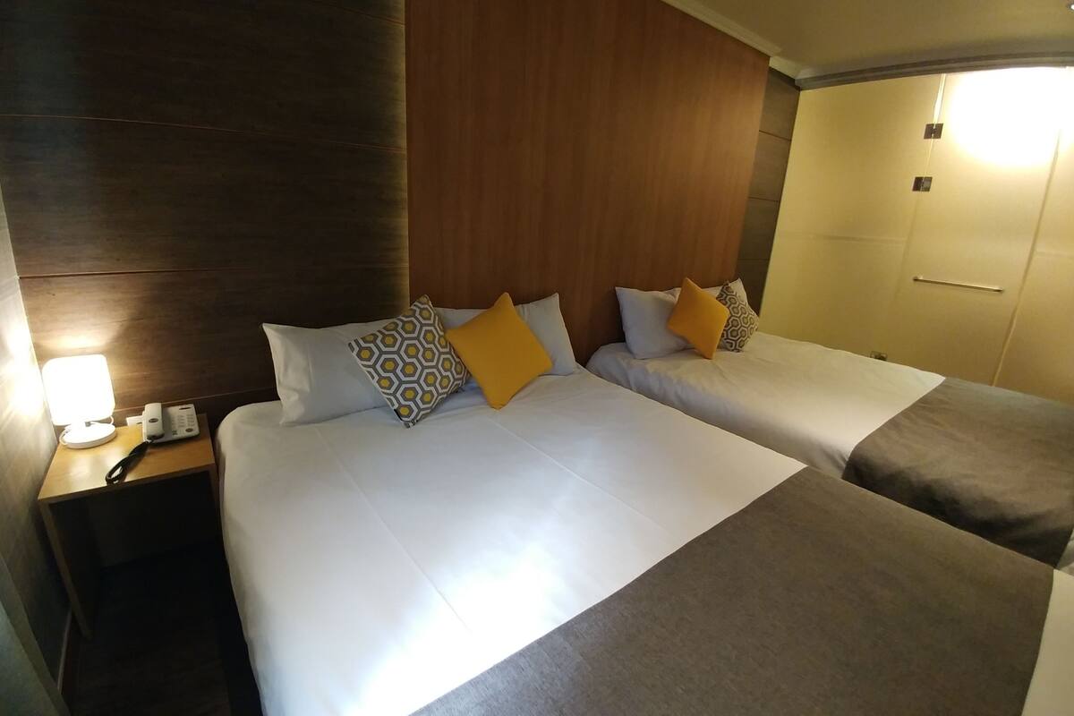 Standard Quadruple Room | Premium bedding, soundproofing, iron/ironing board, free WiFi