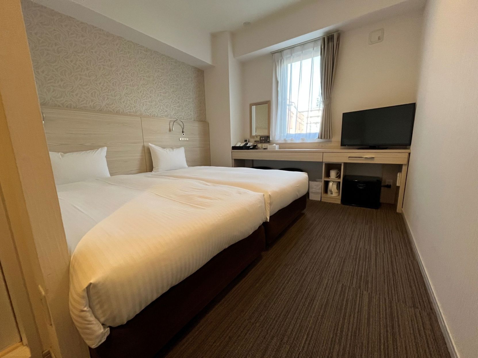 Down duvets, desk, blackout curtains, soundproofing
