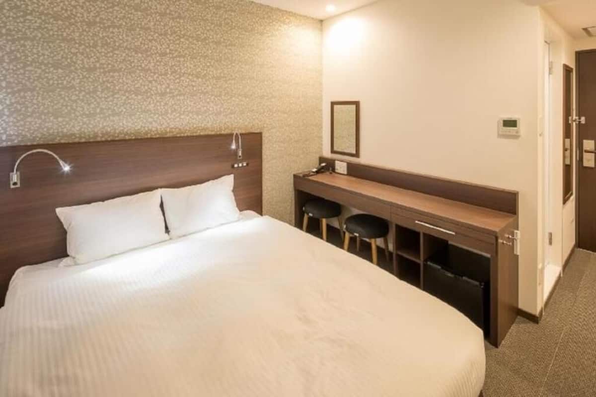 Down comforters, desk, blackout drapes, soundproofing