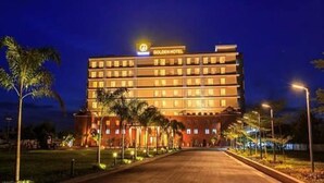 A multi-story hotel building with a sign reading "Golden Hotel" at the top. - Golden Hotel (Mandalay)
