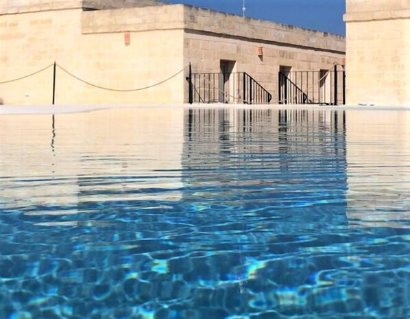 Outdoor pool, sun loungers