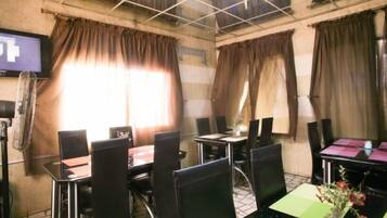 Breakfast, lunch, dinner served; local and international cuisine