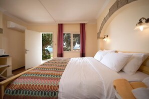 Sábanas de algodón egipcio, ropa de cama de alta calidad y minibar 