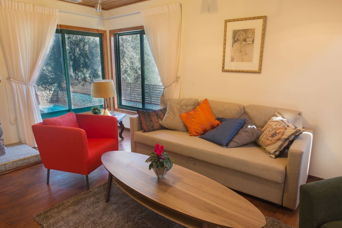 Ferienhaus, Poolblick | Wohnbereich