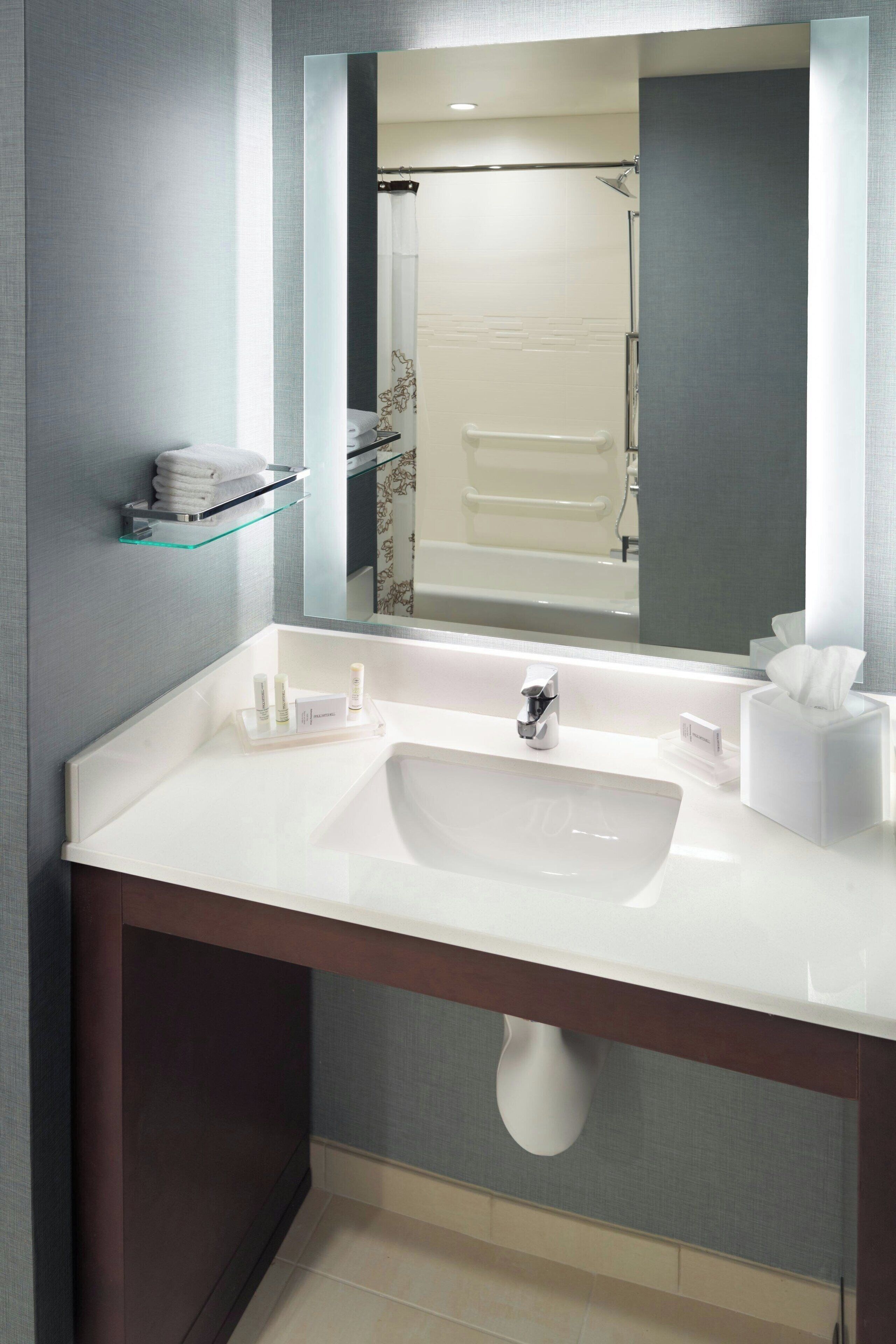 eco-friendly toiletries, hair dryer, towels