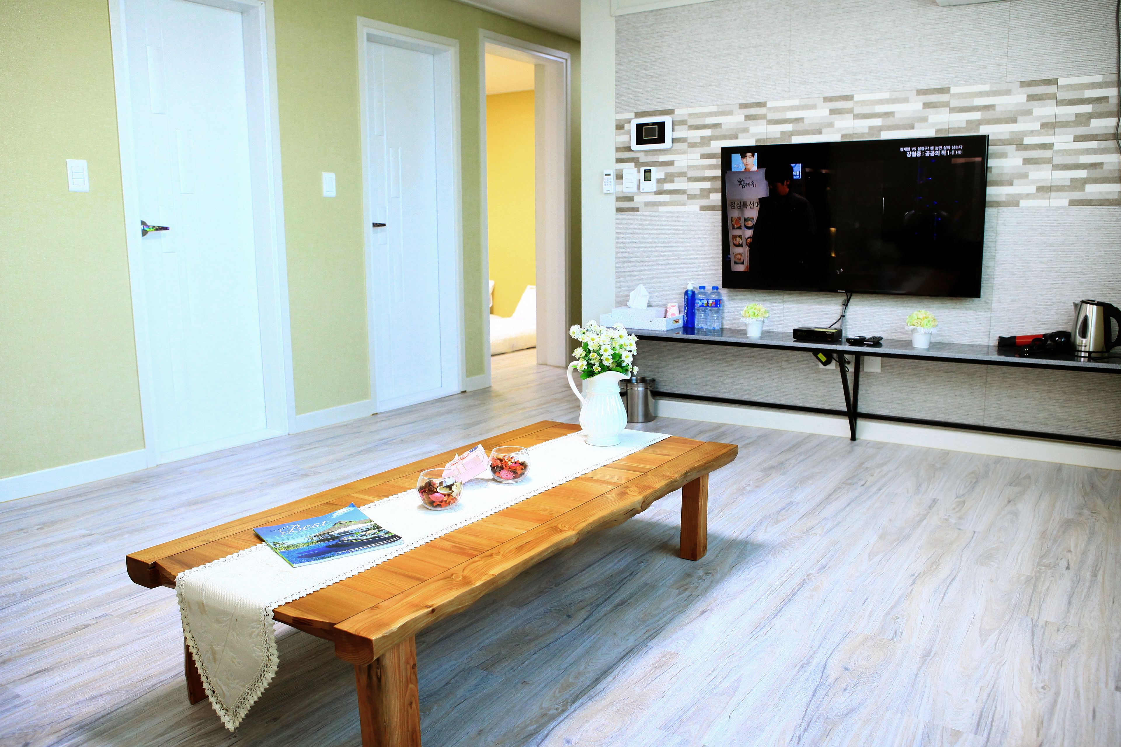 premium studio suite, 2 bedrooms, terrace, city view | living area | flat-screen tv