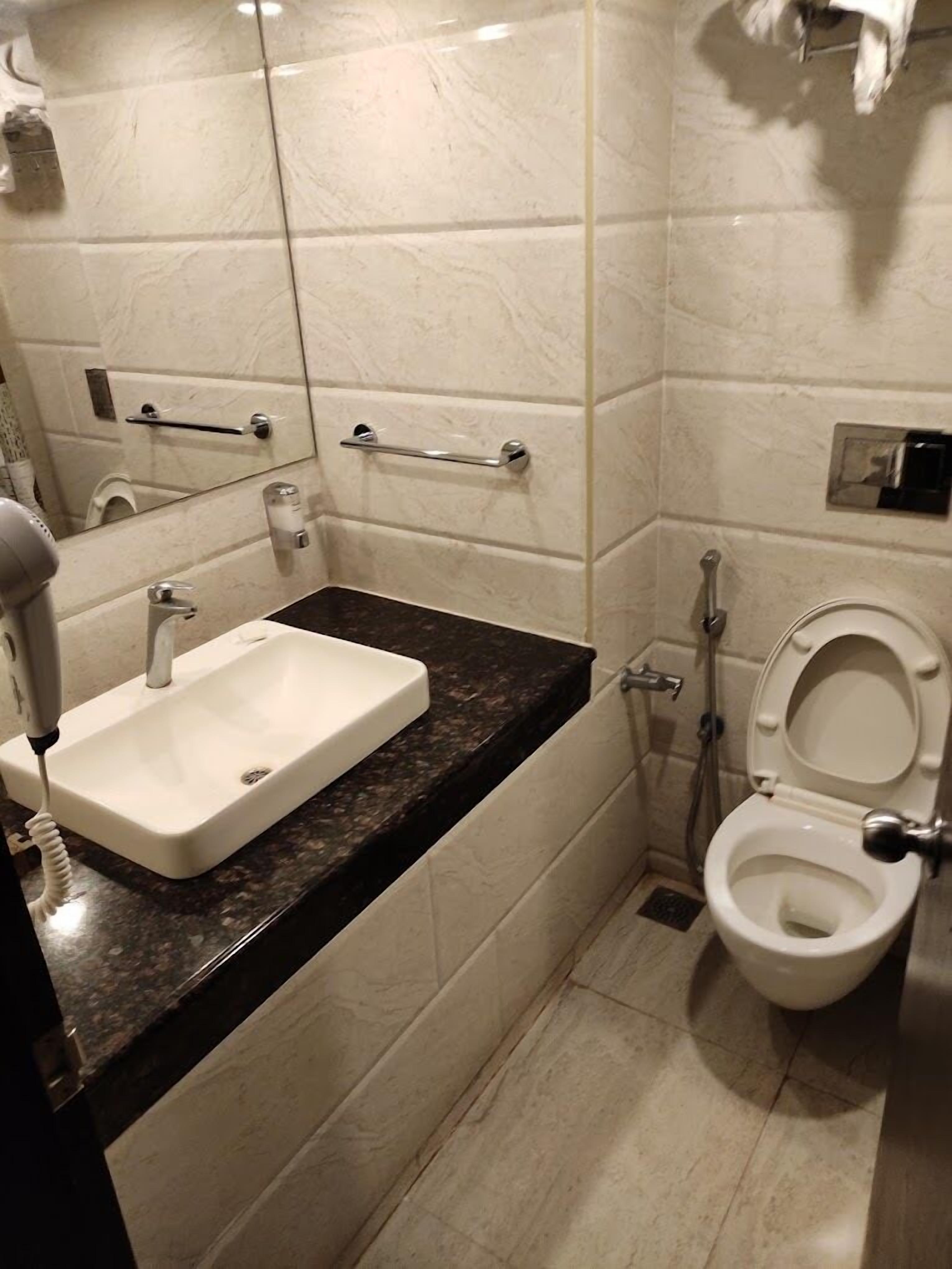 superior room, 1 double bed | bathroom | shower, rainfall showerhead, designer toiletries, hair dryer