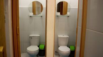 Shower, free toiletries, slippers, towels