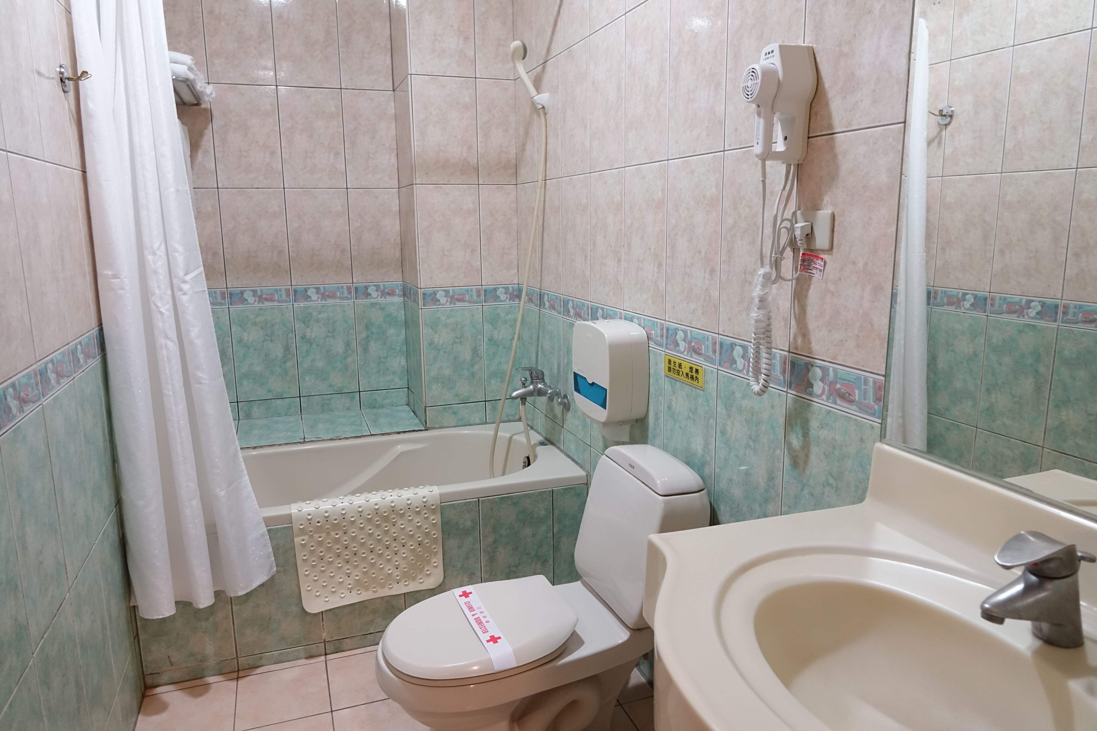 free toiletries, hair dryer, slippers, towels