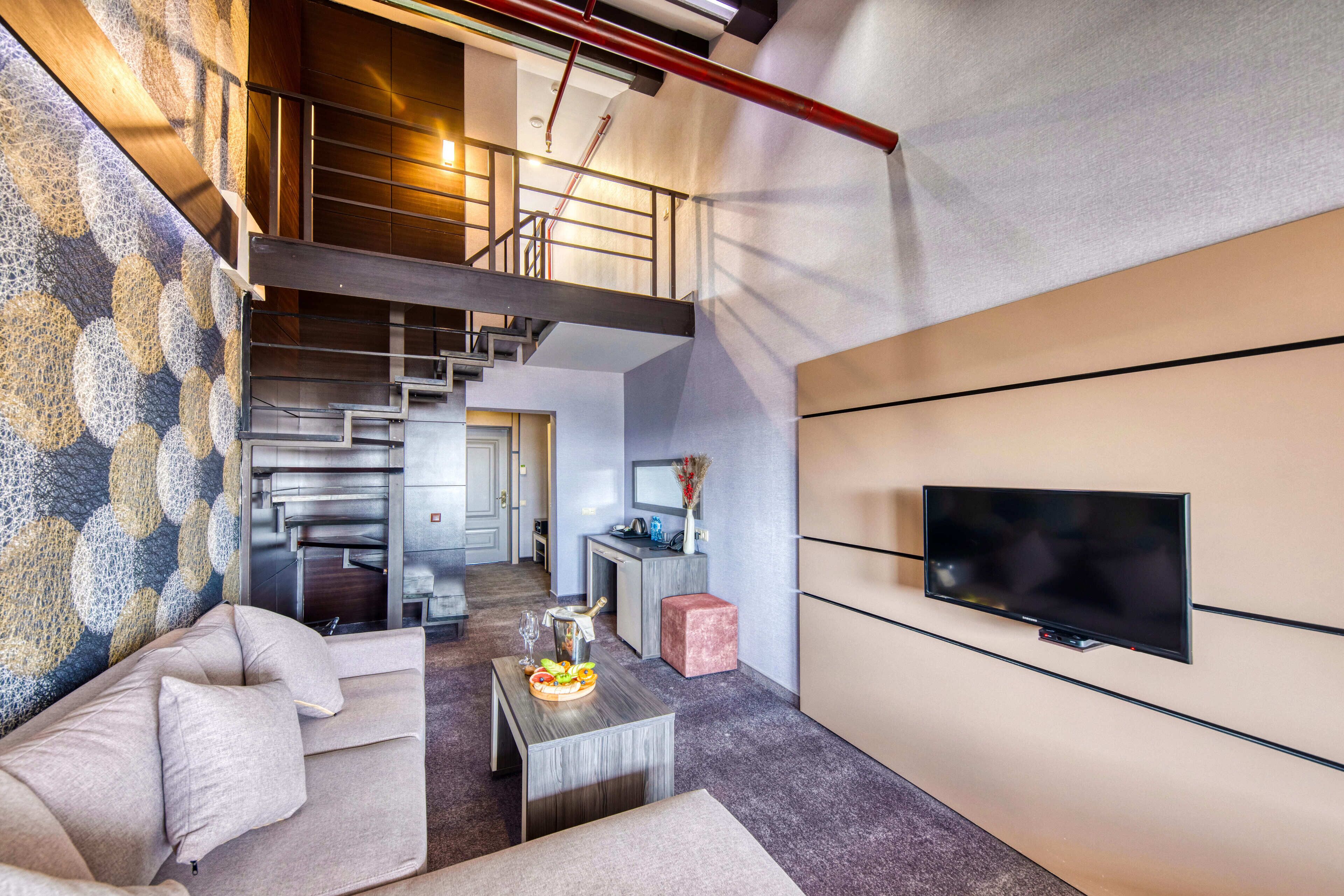 comfort duplex | living area | plasma tv