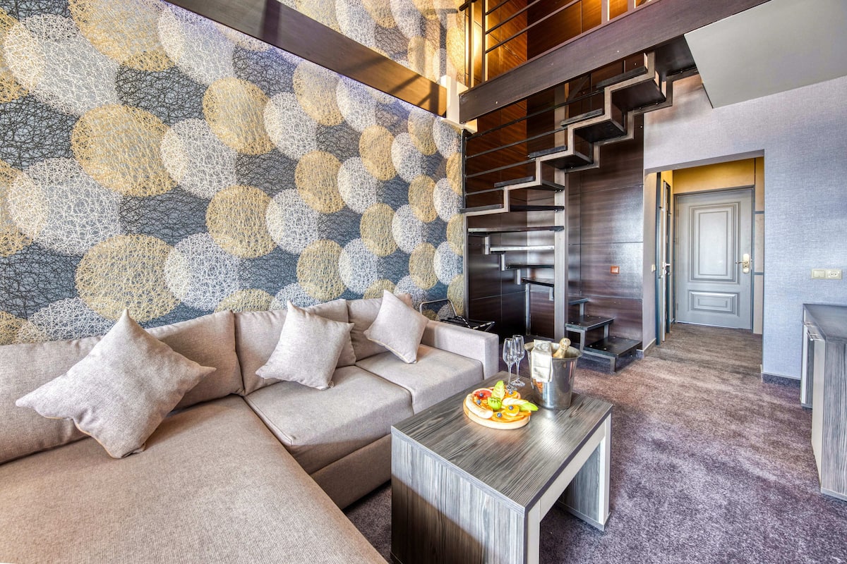 Comfort maisonnette | Woonruimte | Een plasmatelevisie