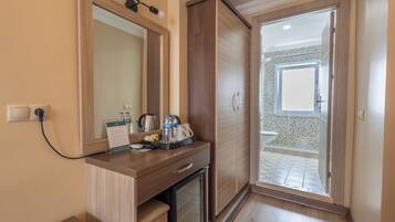 Economy Twin Room, 2 Single Beds | Minibar, in-room safe, desk, soundproofing