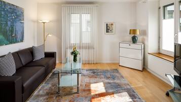 Suite, 1 chambre | Coin séjour