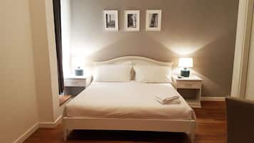 Desk, laptop workspace, free WiFi, bed sheets