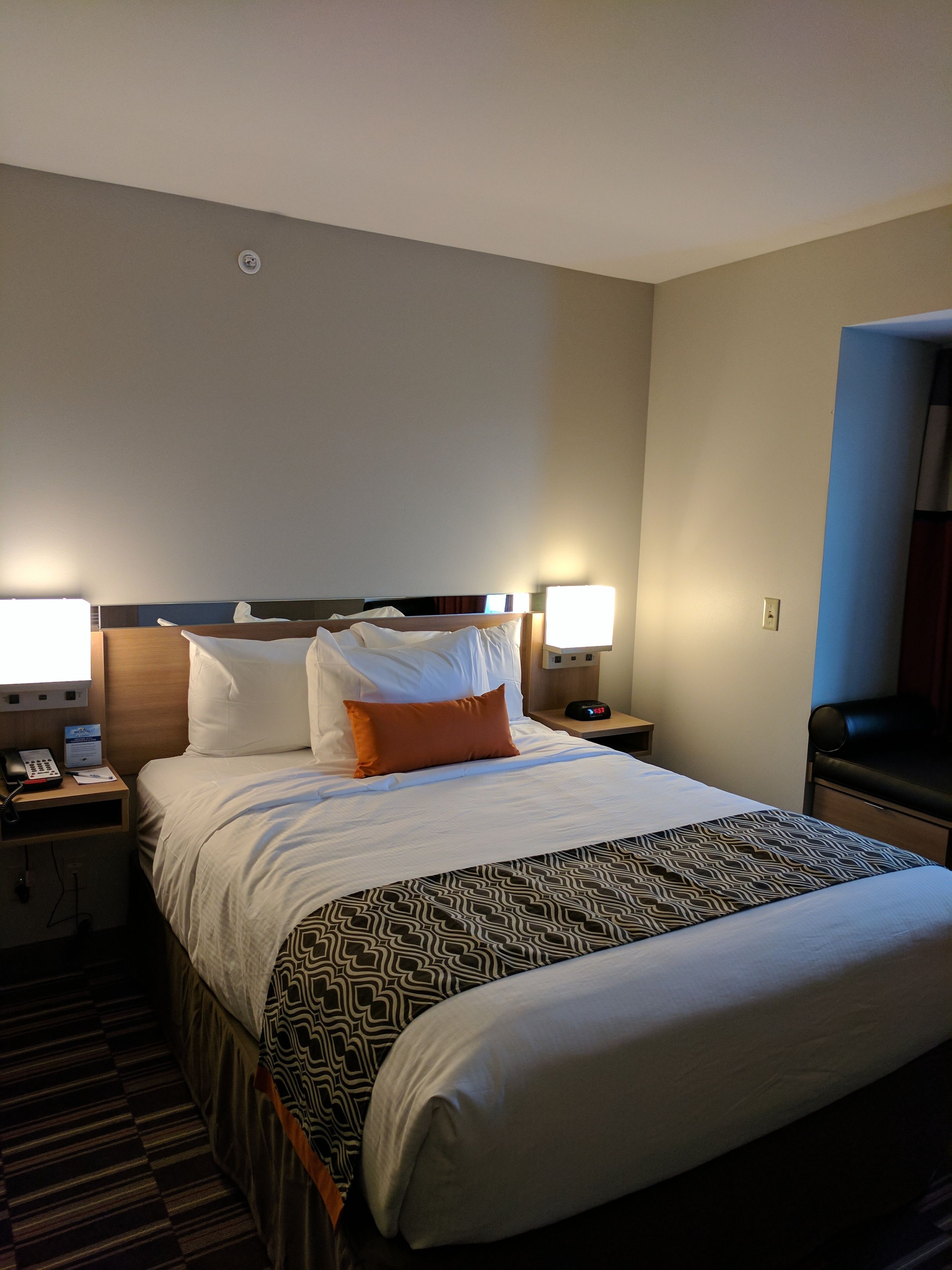 premium bedding, pillow-top beds, desk, laptop workspace