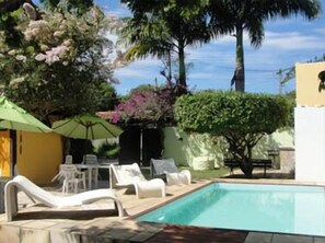 Outdoor pool, pool umbrellas, pool loungers
