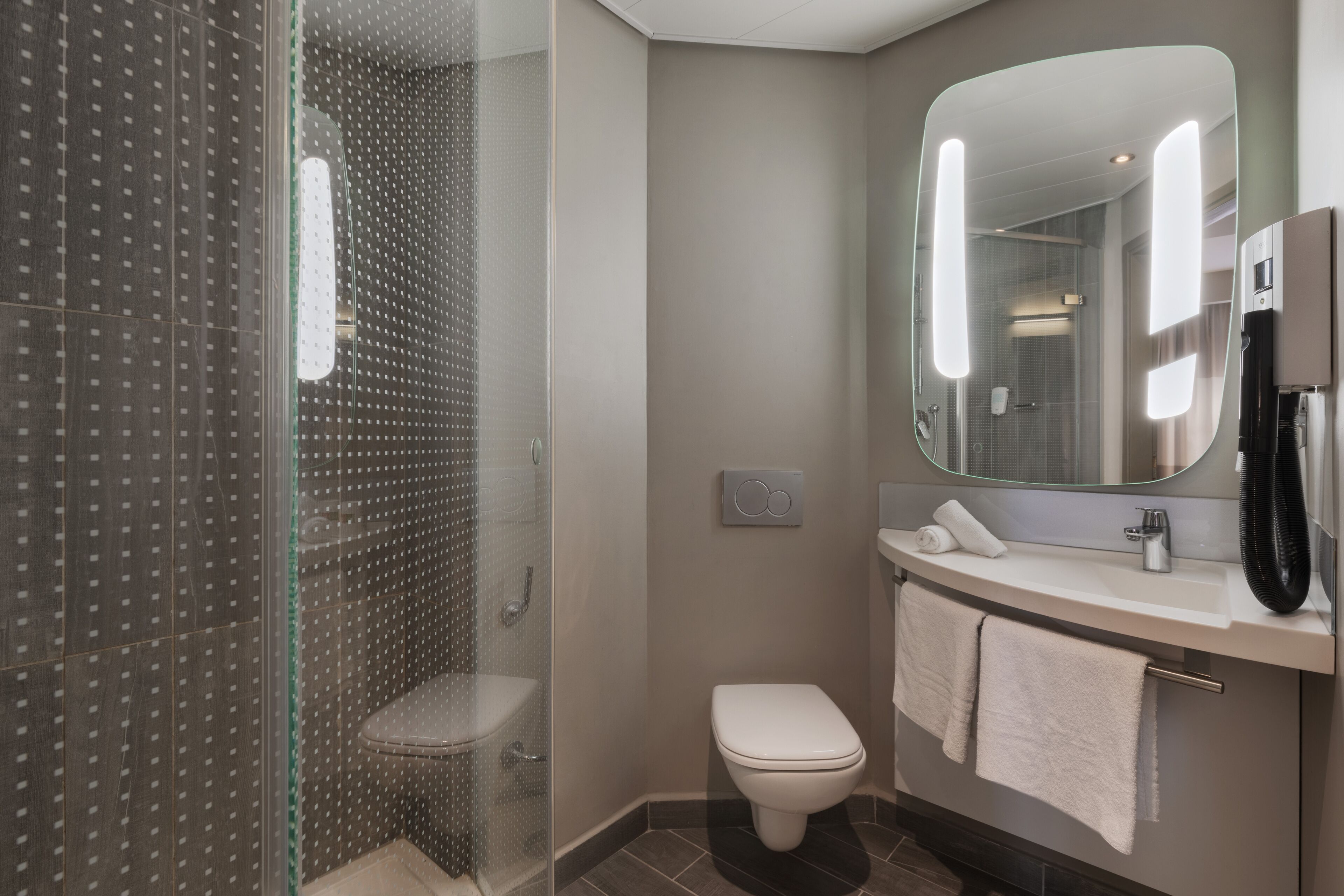 shower, eco-friendly toiletries, hair dryer, towels