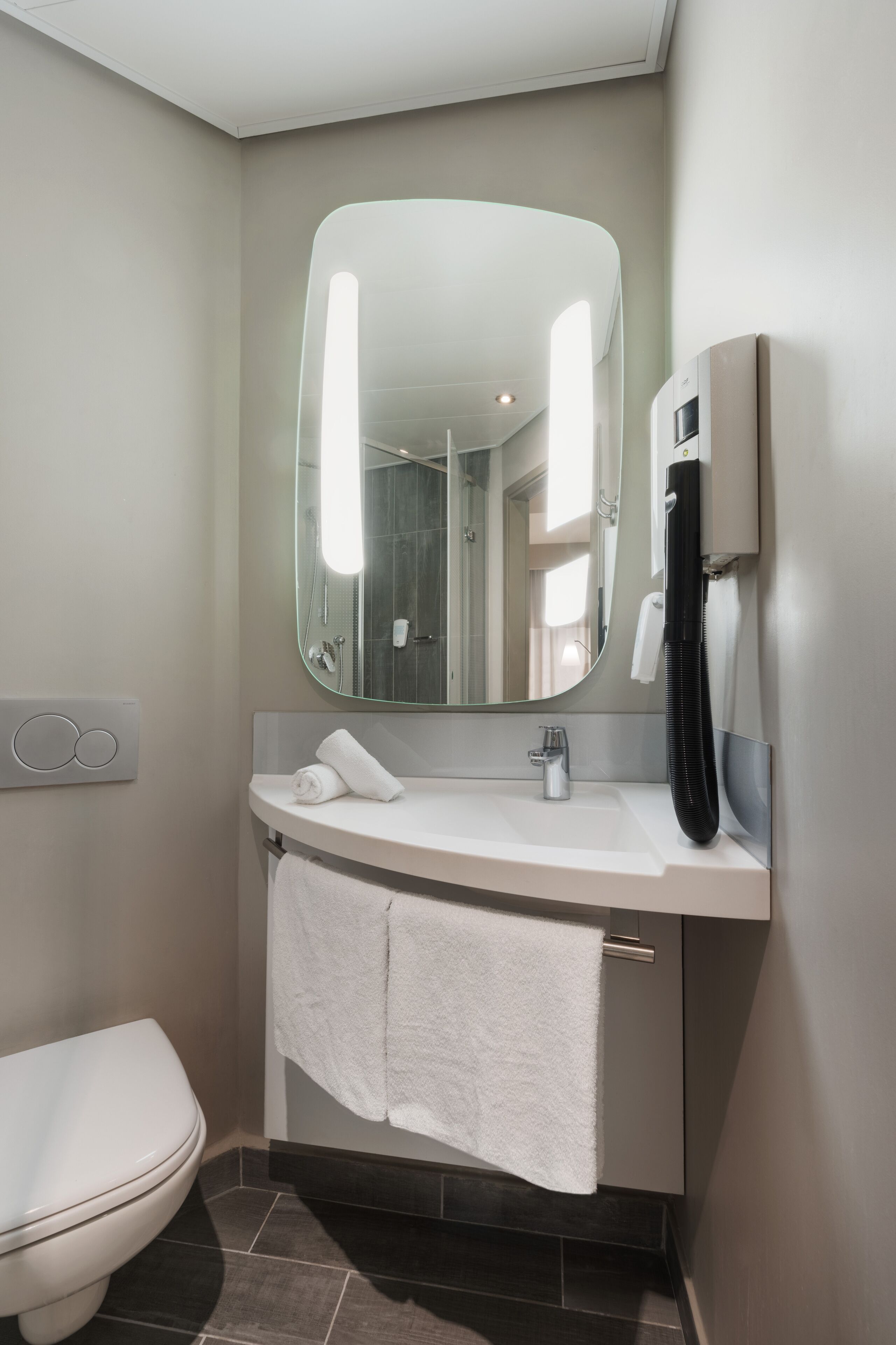 shower, eco-friendly toiletries, hair dryer, towels