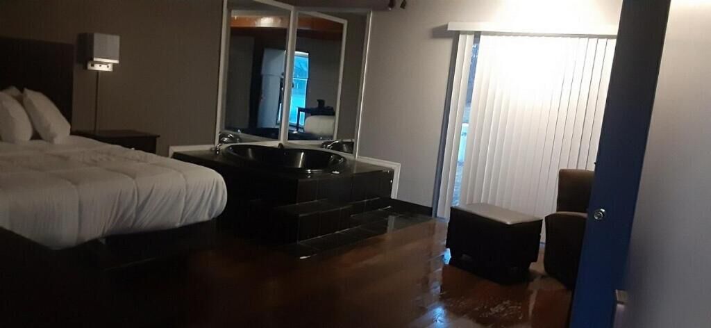 1 bedroom, desk, bed sheets