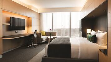 Ropa de cama de alta calidad, minibar, caja fuerte y escritorio