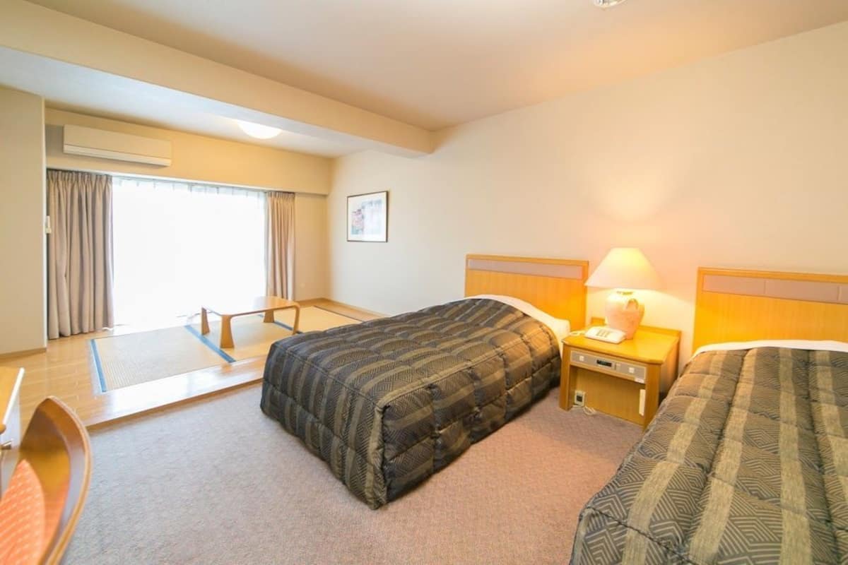 Blackout drapes, iron/ironing board, free WiFi, bed sheets