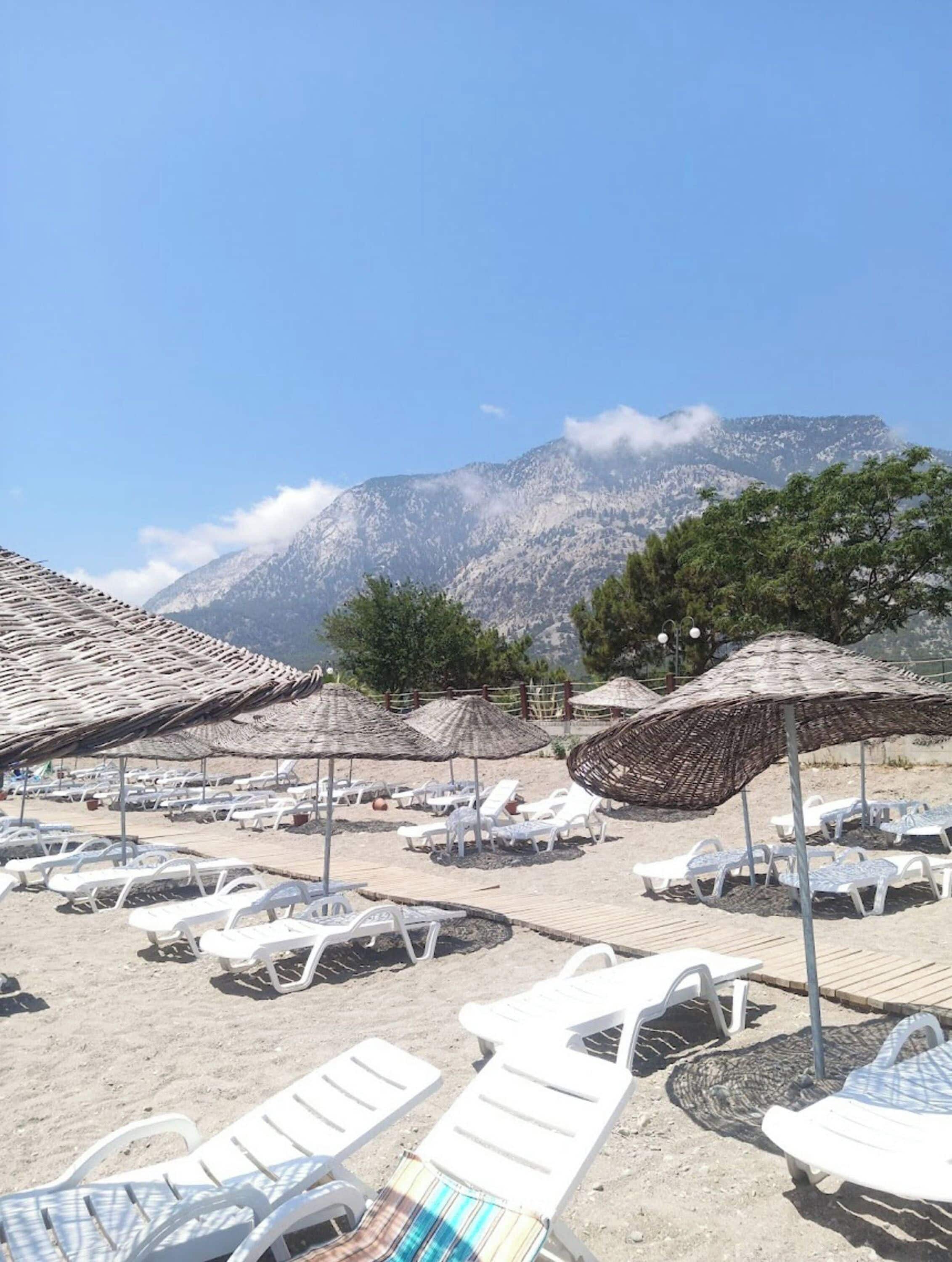 Beach nearby, sun-loungers, beach umbrellas