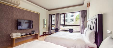 Garden View Quadruple Room | Blackout curtains, free WiFi, bed sheets