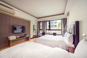 Habitación cuádruple, en la zona del jardín | Cortinas opacas, wifi gratis, ropa de cama